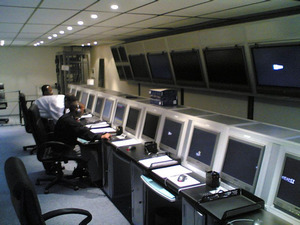 Control Room Operator Monitoring Desks